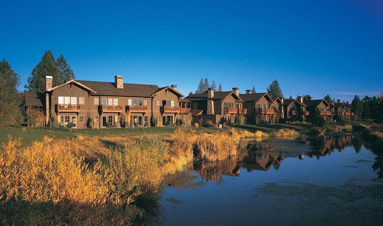 Row of lodging cabins at Sunriver Resort on the Deschutes River near Bend, Oregon
