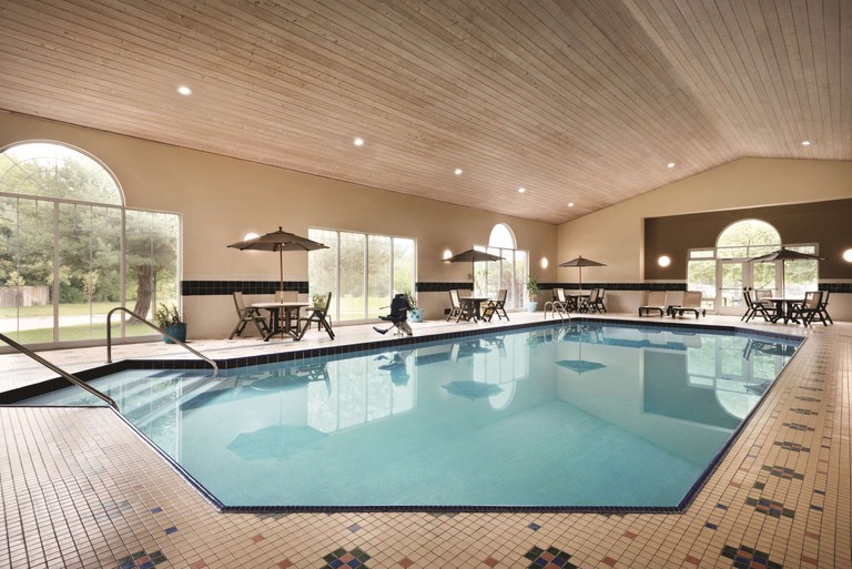The indoor pool with landscape views at the Country Inn and Suites by Radisson, Des Moines West