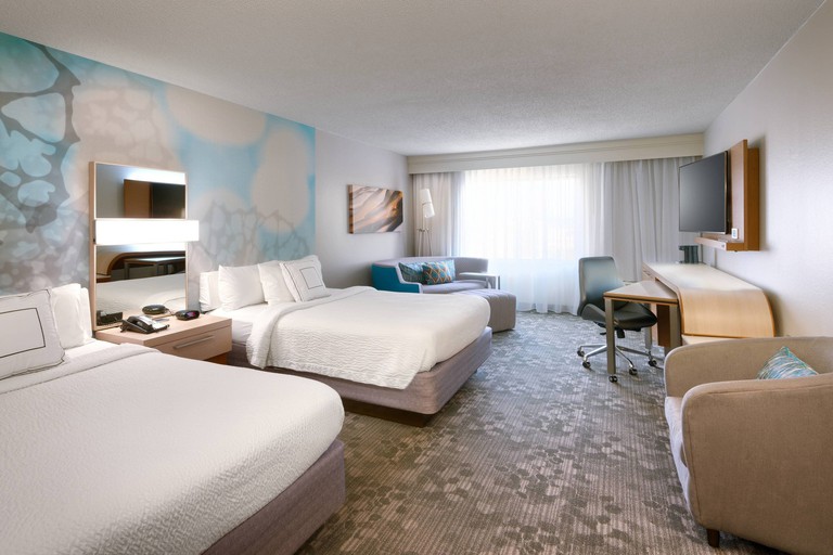 Bedroom at the Courtyard by Marriott Oklahoma City Northwest, with two beds and decorated in light colors