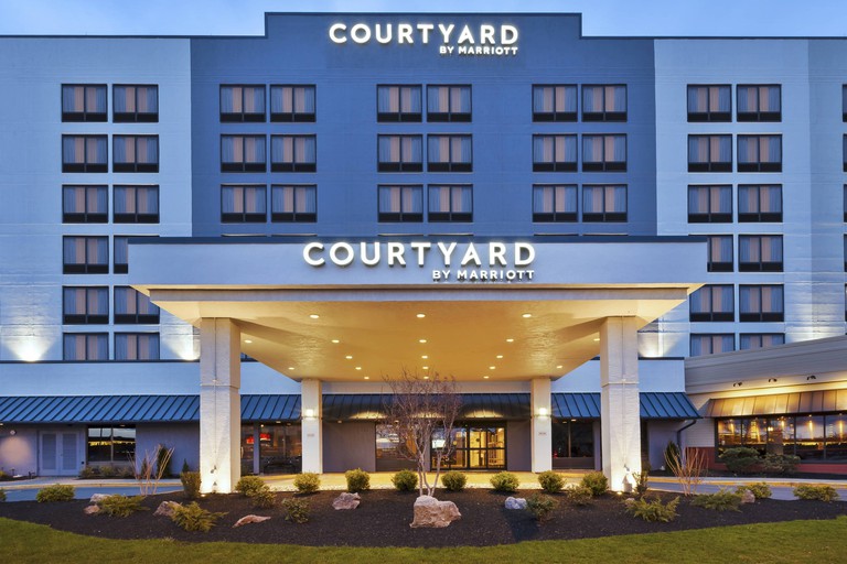 Exterior of Courtyard Secaucus Meadowlands, lit up in the evening