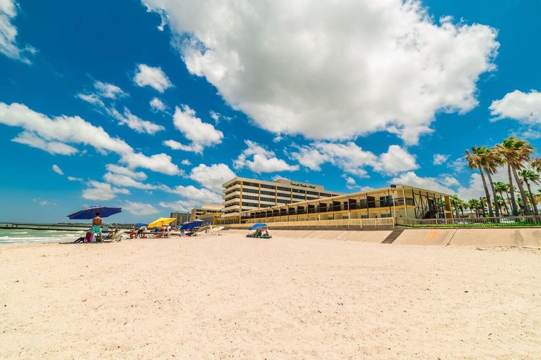 View of the Emerald Beach Hotel from the beach