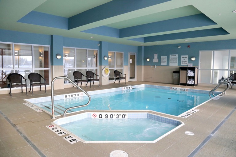 Indoor pool area at Holiday Inn Express and Suites Brampton