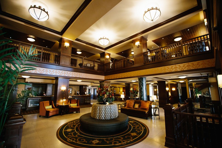 The elegant two-story lobby at the Hotel Julien Dubuque