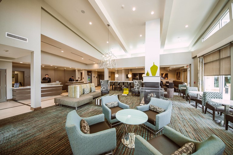 The contemporary lobby with lots of seating at the Residence Inn by Marriott Harlingen