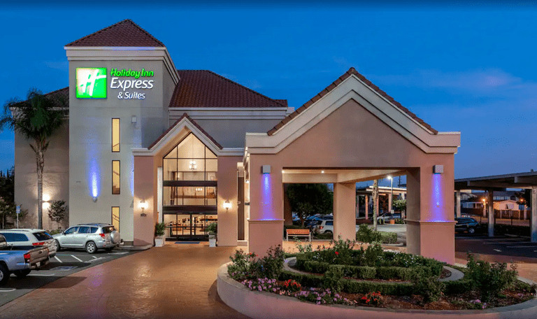 Exterior view of the entrance to Holiday Inn Express & Suites Lathrop, an IHG Hotel