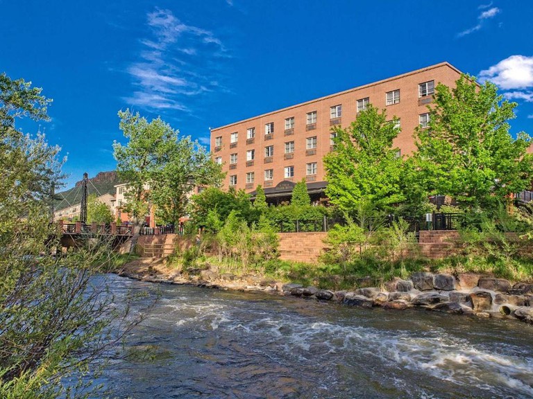 The Golden Hotel, Ascend Hotel Collection seen from the river next to the hotel in Golden, Colorado