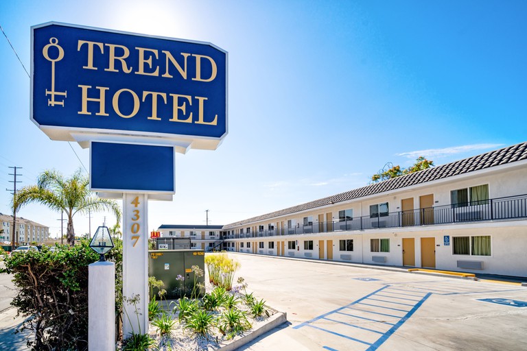 Exterior of Trend Hotel at LAX Airport, with on-site car parking