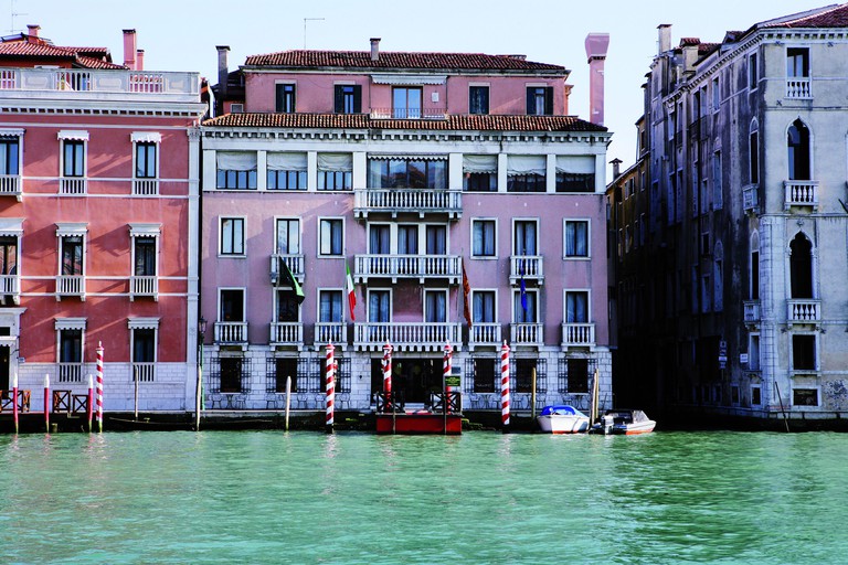 Traditional Venetian exterior in pink of the Sina Palazzo Sant'Angelo on the Grand Canal in Venice