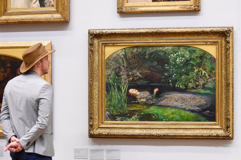 London, UK.  5 September 2018.  A visitor views "Ophelia", 1851-52, by John Everett Millais, at Tate Britain, ahead of the launch of a major new exhibition at the National Gallery of Australia (NGA) in December 2018.  Over forty Pre-Raphaelite works will