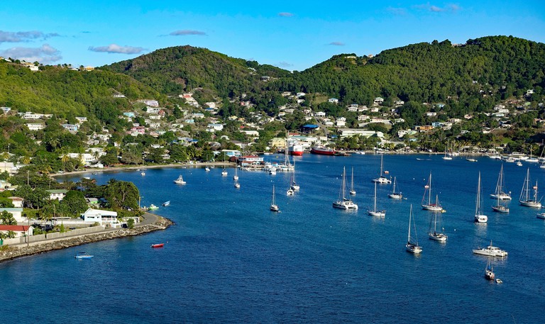 Boats approach the harbor of Port Elizabeth in Bequia, St Vincent and the Grenadines